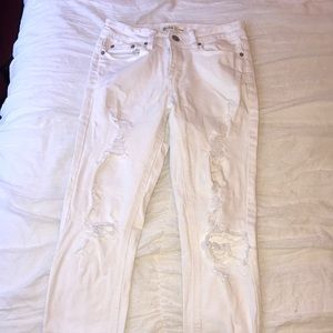 super cute white ripped jeans with frayed bottom!!